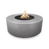 The Silver Florence Concrete Gas Fire Pit boasts a sleek metallic gray hue with a modern, polished texture. The reflective surface enhances the brilliance of the dancing flames. This contemporary centerpiece is perfect for urban rooftop lounges, commercial fire pit zones, and high-end outdoor living spaces.