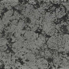The Outdoor Plus 54-inch Occasional Height Florence concrete gas fire pit swatch in rustic gray, characterized by a speckled, weathered texture with deep gray and black tones, evoking a distressed and timeless appeal.
