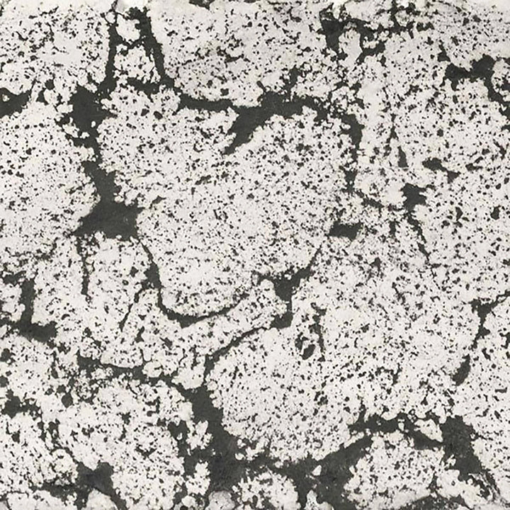 The Outdoor Plus 60 Del Mar Concrete Gas Fire Pit swatch in rustic white, designed with a marble-like finish for a classic, clean aesthetic. This color brings a timeless elegance to patio fire pits, enhancing outdoor decor with a white, textured appearance.