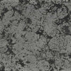 The Outdoor Plus 72-inch Del Mar Concrete Gas Fire Pit swatch in rustic gray, showcasing a speckled dark gray pattern that brings a rugged charm to outdoor settings. Ideal for creating a rustic, natural look in backyards and patios.