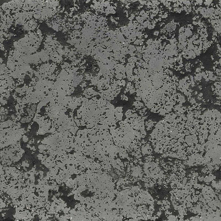 A swatch of The Outdoor Plus 84" Del Mar Concrete Gas Fire Pit in Rustic Gray, showcasing a rugged, textured appearance with darker gray tones. Suited for outdoor designs aiming for a weathered, earthy aesthetic. 