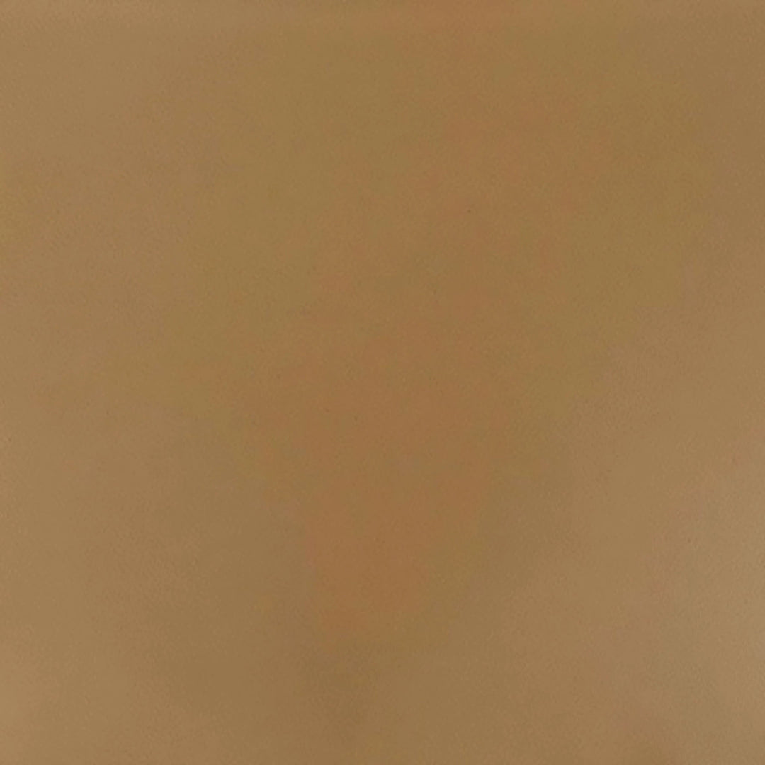Swatch of the bronze finish for The Outdoor Plus 96-inch Del Mar concrete gas fire pit, highlighting a rich, metallic bronze hue with a refined concrete texture. Ideal for adding warmth and elegance to outdoor settings.