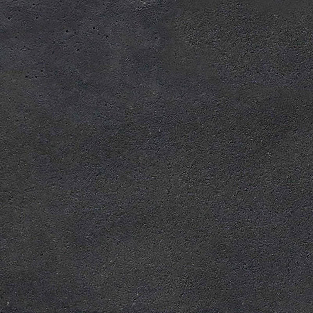 Slate color swatch of The Outdoor Plus 96-inch Del Mar Concrete Gas Fire Pit. Features a dark stone finish, perfect for creating a bold and dramatic statement in your outdoor backyard fire pit area.