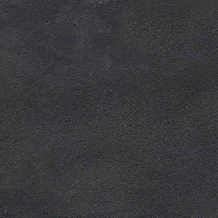 Slate color swatch of The Outdoor Plus 96-inch Del Mar Concrete Gas Fire Pit. Features a dark stone finish, perfect for creating a bold and dramatic statement in your outdoor backyard fire pit area.