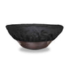 Front view of The Outdoor Plus round bowl fire pit cover fully covering a medium-sized fire bowl. This durable cover features a form-fitting design with reinforced stitching, providing all-around protection from rain, wind, and debris. The high-quality black fabric material is suitable for year-round outdoor use, ensuring your fire pit stays in top condition.