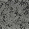 Close-up texture of The Outdoor Plus in Rustic Gray finish. The fire pit showcases a rugged, weathered gray finish with unique concrete textures. Perfect for enhancing outdoor spaces with a rustic, modern look. Ideal for patios, backyards, and commercial outdoor settings. Designed for natural gas or propane use. A durable, stylish option for year-round fire pit enjoyment
