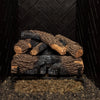 A 16-inch set of vented Charred Oak gas logs by Real Fyre, arranged without flame in a black herringbone-lined fireplace. These realistic logs, with a natural charred oak finish and intricate bark details, are ideal for enhancing any traditional gas fireplace setting.