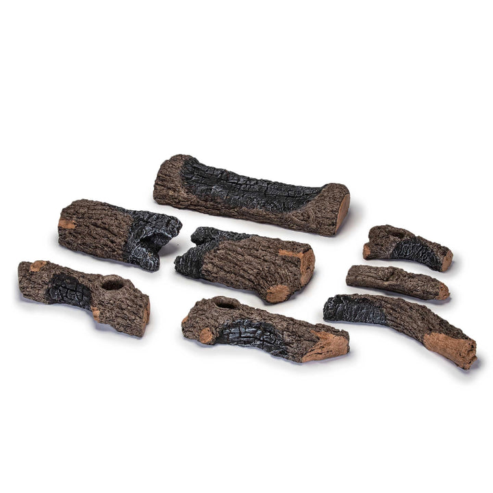 24-inch Real Fyre Vented Charred Oak Gas Logs disassembled set, showcasing each log's realistic charred texture and detailed oak grain. This set includes multiple log pieces designed for vented gas fireplaces, offering an authentic wood-burning appearance. Ideal for creating a warm, inviting ambiance in any fireplace.