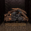 Stacked 24-inch Real Fyre Vented Charred American Oak Gas Logs in a fireplace grate without flames, highlighting the detailed bark and charred textures. This natural gas log set provides a realistic wood-like appearance in traditional fireplaces.