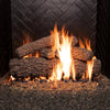 Real Fyre vented Post Oak gas logs, 30 inches, glowing with vibrant flames in a fireplace. Featuring natural bark texture, arranged for optimal fire presentation.